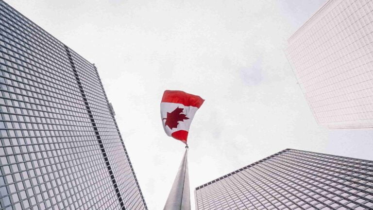 canadian flag and buildings
